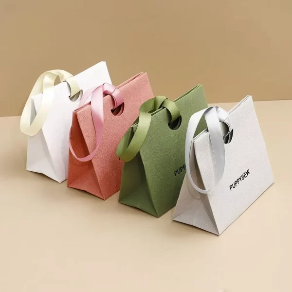 luxury-textured-paper-gift-bags-in-bulk-with-ribbon-closure-coordinated-jewelry-boxes-5